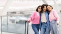 Ready For Trip. Three Happy Female Friends Posing At Airport Terminal Royalty Free Stock Photo