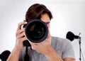 Ready for your close-up. A photographer aiming his camera at you. Royalty Free Stock Photo