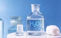 Reagent bottle with glass stopper, with hydrogen peroxide inside. Chemical element H2 O2 in laboratory Royalty Free Stock Photo