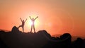 The real adventures of the sunrise and the two successful minds in the summit mountains Royalty Free Stock Photo