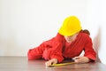 Real architect taking measures while planing house renovation Royalty Free Stock Photo