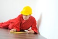 Real architect taking measures while planing house renovation Royalty Free Stock Photo