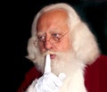 Real-bearded Santa saying Shhh!