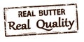 Brown stamp with text Real butter