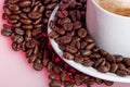 Real coffee beans near milk mug Royalty Free Stock Photo
