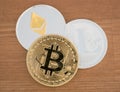 Real coins of cryptocurrency Bitcoin Ethereum and Litecoin