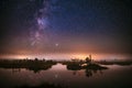 Real Colorful Night Stars Above Swamp. Milky Way Galaxy In Night Starry Sky Above Rural Landscape In Summer Season Royalty Free Stock Photo