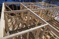 Real construction of wooden frame house, details of elements of future rooms