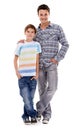 Real cool dudes...Full-length portrait of a father and son standing beside each other, isolated on white. Royalty Free Stock Photo