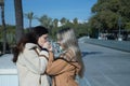 Real couple of young women, holding hands, while one kisses the hands of the other. Concept lgtbiq+, lesbian, in love, inclusion Royalty Free Stock Photo