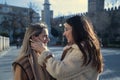 Real couple of young women, hugging and looking into each other`s eyes, caressing each other`s face in affectionate attitude. Royalty Free Stock Photo