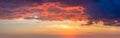 Real dramatic sunrise against a sky with colorful clouds. Without any birds. Large panoramic photo. Sunset, sundown. This is real Royalty Free Stock Photo