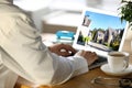 Real estate agency online service. Doctor choosing new house via laptop Royalty Free Stock Photo