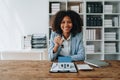 Real estate agent, African American businesswoman Africans use smartphone and calculators to offer mortgages to their Royalty Free Stock Photo