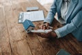 Real estate agent, African American businesswoman Africans use smartphone and calculators to offer mortgages to their Royalty Free Stock Photo