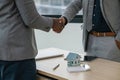 Real estate agent African American handshake to customer indian to congratulate after signing a contract to buy a house Royalty Free Stock Photo