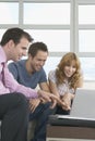 Real Estate Agent And Couple With Laptop In New Home Royalty Free Stock Photo