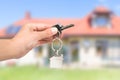 Real estate agent giving house key. Royalty Free Stock Photo