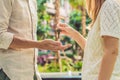 Real estate agent giving keys to apartment owner, buying selling property business. Close up of male hand taking house