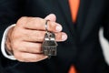 Real Estate Agent Handing over an house key. Royalty Free Stock Photo