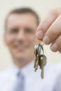 Real-estate agent handing over keys Royalty Free Stock Photo