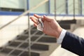 Real estate agent holding keys, closeup Royalty Free Stock Photo