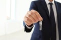 Real estate agent holding keys Royalty Free Stock Photo