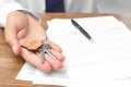 Real estate agent with keys and documents Royalty Free Stock Photo