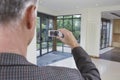 Real Estate Agent Photographing New Property Royalty Free Stock Photo