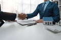 real estate agent shaking hand his client after signing contract,concept for real estate, moving home or renting Royalty Free Stock Photo