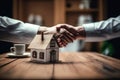 Real estate agent shaking hands with buyer after signing the contract. Generative AI Royalty Free Stock Photo