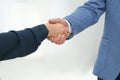 Real estate agent shaking hands with client in new apartment, closeup Royalty Free Stock Photo