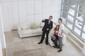 Real Estate Agent Showing Couple New Home Royalty Free Stock Photo