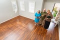 Real Estate Agent Showing Senior Adult Couple A New Home Royalty Free Stock Photo
