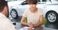 Real estate agent signing contract with female client Royalty Free Stock Photo