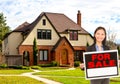 Real estate agent standing outside house Royalty Free Stock Photo