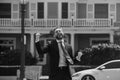 Real estate agent welcoming visitors near new house. Portrait of excited realtor man. Royalty Free Stock Photo