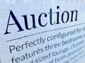 Real Estate Auction Sign glass with waterdrop after rainy day. Royalty Free Stock Photo