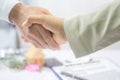 .Real estate broker and customer shaking hands after signing a contract: Royalty Free Stock Photo