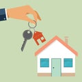 Real estate concept in flat style - hand agent holds a key with