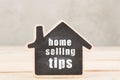 Real estate concept - Home selling tips, house model