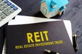 Real estate investment trust REIT on a desk. Royalty Free Stock Photo