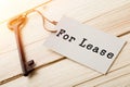 real estate lease concept - old key with tag Royalty Free Stock Photo