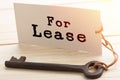 real estate lease concept - old key with tag Royalty Free Stock Photo