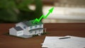 Real estate market boom, soaring prices. Fancy suburban house with rising green arrow. Digital 3D render