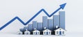 Real estate market trend visualization with houses and ascending bar graph. Housing economy and investment concept.