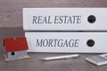 Real Estate and Mortgage binders with house or home Royalty Free Stock Photo