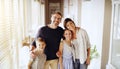 Real estate, portrait and happy family in new house with love, care or future security while bonding. Property, mortgage Royalty Free Stock Photo