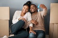 Real estate, property and African couple with keys to their new home, excited and moving. Home owner, happy and portrait Royalty Free Stock Photo