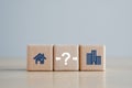 House or Apartment with question mark icon concept for decision to choose the best property. Royalty Free Stock Photo